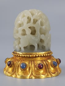 A bronze gilt jade-inlaid hearth hat top