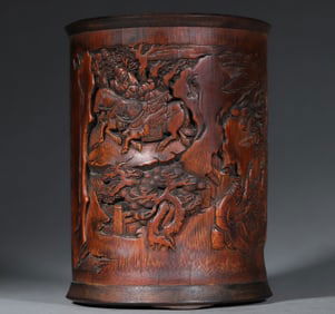An old bamboo carved figure pen holder from the Qing Dynasty