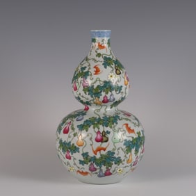 A Qing Dynasty enamel color Fulu pattern gourd bottle