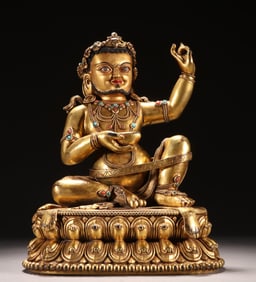 A Qing Dynasty bronze gilt statue of the Great Achiever