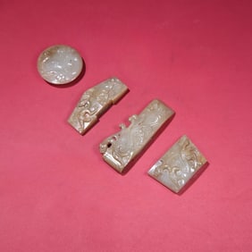 A set of Hetian Yusheng pit full of dragon sword ornaments