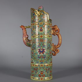 A Qianlong enamel green land painted gold entwined lotus bamboo pot from the Qing Dynasty