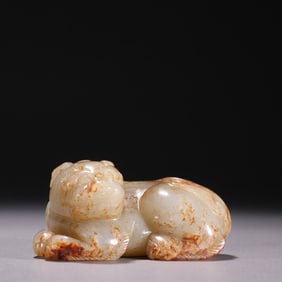 A Ming Dynasty Hetian Yurui beast carving