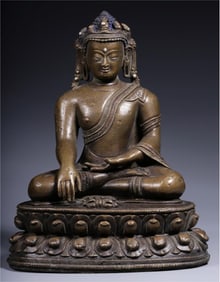 A seated statue of the Buddha of the Qing Dynasty alloy copper inlaid with silver