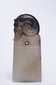 A piece of Hetian jade in the Ming Dynasty has a dragon on the Brown Qin Mansion