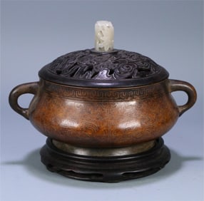 A Ming Dynasty "Shisuo" type copper and silver wire gluttonous pattern amphora