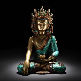 A bronze inlaid gemstone painted gold Tibetan Tantric Buddha Shakyamuni Buddha statue