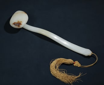 A piece of scholar's elegant white jade "unicorn spitting book" Ruyi handle