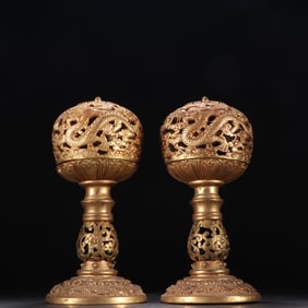 A pair of Qing Dynasty bronze gilt cloud dragon pattern crown frames