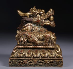 A Qing Dynasty bronze gilt plate dragon spit bead seal