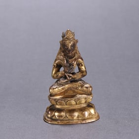 A bronze gilt statue of the Great Sun
