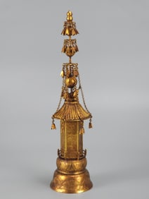 A piece of bronze gilt relic