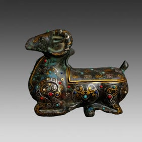 A piece of the Han Dynasty bronze mistake, gold mistake, silver inlaid turquoise sheep zun