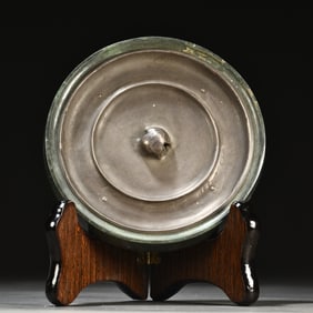 A swirled bronze mirror from the Tang Dynasty