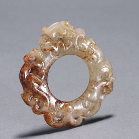 A piece of Hetian jade carving of the Han Dynasty with a dragon pattern out of the outline
