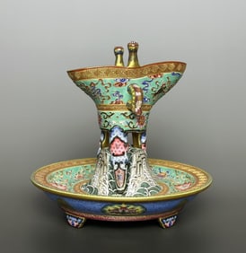 A piece of the Qing Dynasty's Fushou pattern Fushan Shouhai three-legged cup Jue cup set