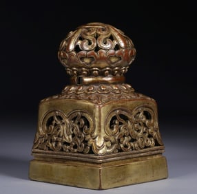 A Qing Dynasty bronze gilt carved grass seal
