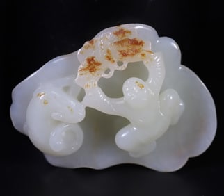 A piece of Hetian jade in his old age, a child playing with a cat