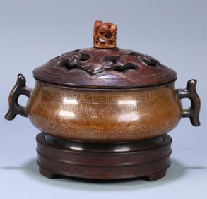 A Ming Dynasty "Shisuo" type copper wrong silver wire gluttonous pattern double fish ear stove