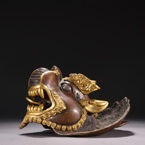 A piece of Qing Dynasty bronze gilt dragon head