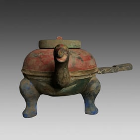 A Han Dynasty bronze painted bird's head pot