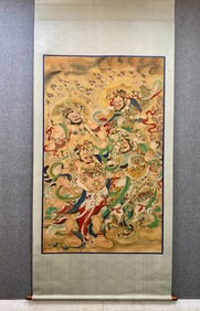 A large statue of Ding Yunpeng's Four Heavenly Kings is in the middle hall on silk