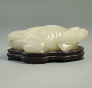 A Qing Dynasty Hetian white jade seed material cloud mantle ornament