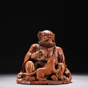 A piece of Qing Dynasty bamboo carving Fuhu Arhat