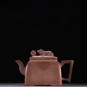 A purple sand lion playing ball teapot in the stone forest
