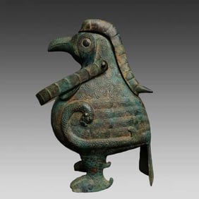 A piece of Warring States bronze eagle handle glaze