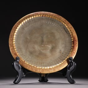 A piece of Maitreya Buddha head statue of Ru kiln gold
