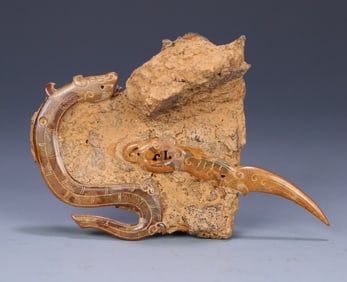 A piece of the ancient jade dragon carving of the Han Dynasty