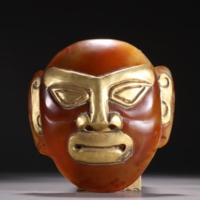 An agate gold-covered mask of Liaojin