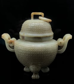 A piece of Hetian jade's Guwen three-legged incense burner