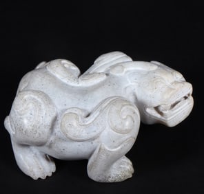 A piece of ancient Hetian jade gray skin full of Qinrui beast