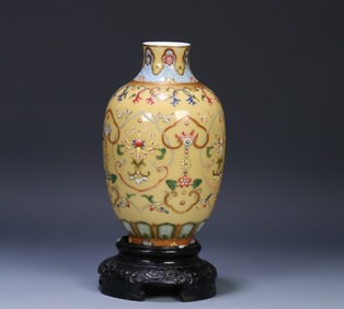 A Qing Dynasty yellow ground pastel depiction of the gold treasure vase