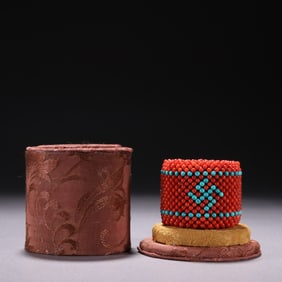 A piece of agarwood bag rice inlaid with turquoise swastika wrench