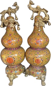 A pair of Qing Dynasty cloisonné gourd bottles