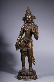 A Qing Dynasty alloy copper inlaid silver statue of Guanyin