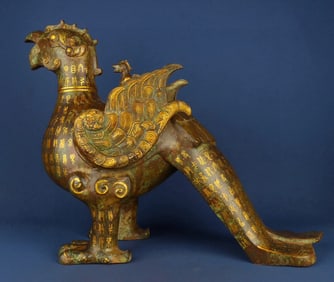 A piece of bronze wrong golden bird statue of the Western Zhou Dynasty
