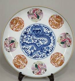 A blue and white bucket pastel dragon and phoenix plate from the Qing Dynasty