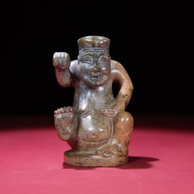 A Han Dynasty Manqin rap figurine