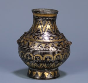 A small jar of gold and silver gluttonous ears from the Han Dynasty