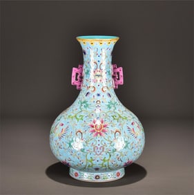 A Qing Dynasty Qianlong green pastel phoenix peony picture amphora