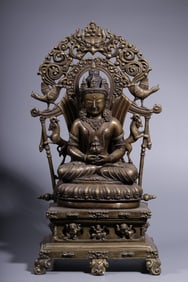 A backlit statue of the Buddha Amitayus with silver inlaid with alloy copper from the Qing Dynasty