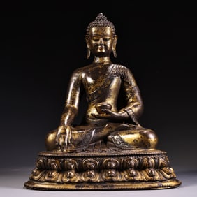 A bronze clay gold statue of Shakyamuni Buddha