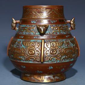 A bronze relief gilt gilt silver gluttonous pattern made in the Qianlong year of the Qing Dynasty
