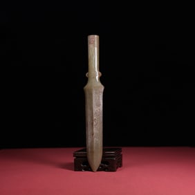 A piece of Hetian jade's Manqin fish pattern handle type ware