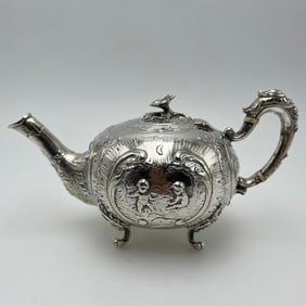 A piece of German sterling silver high relief fairy tale teapot