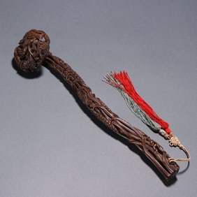 A Qing Dynasty small-leaf red sandalwood carved bergamot wheat ear Ruyi ornament